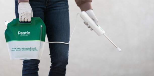 Woman spraying Pestie