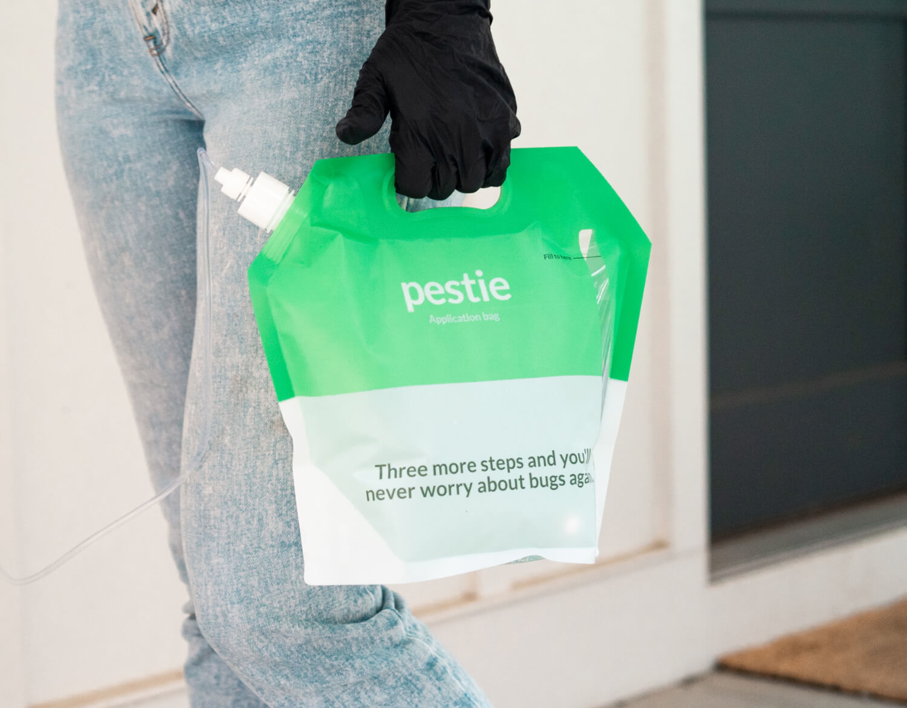 Woman holding Pestie Application Bag